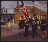 Photograph of Air Force ROTC cadets carrying the colors in a parade